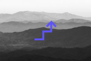mountain background image with blue arrow up